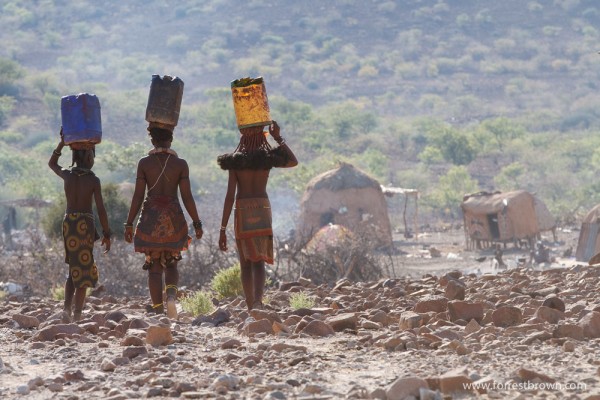 Young Himba Women Carrying Water